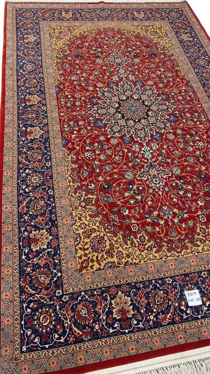 High-quality Persian rug designed with floral patterns and golden highlights.